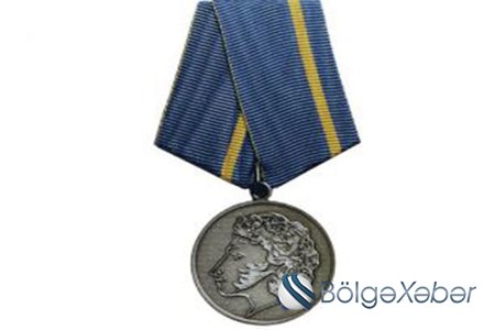 Putin Ağabəy Əsgərova medal verdi