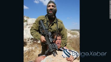 İsrail əsgərinin 11 yaşlı fələstinliyə qarşı amansız hücumu – FOTO + VİDEO