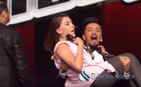 Xalq artisti səhnədə iştirakçını qucağına aldı — Video - VİDEO