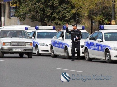 DYP işçisi, «avtoş» atası və yol kəsən polis əməkdaşı