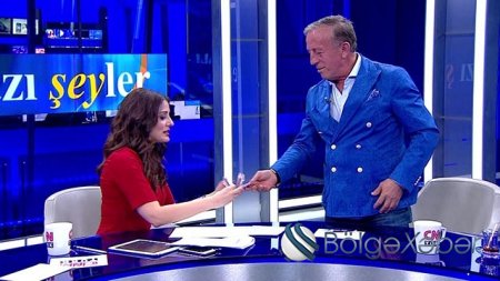 Canlı yayımda milyarderin cibindən 8 min çıxdı-VIDEO