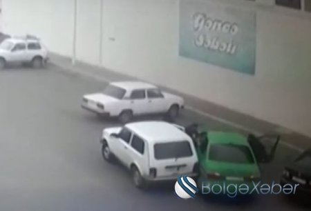 Gəncədə polislə silahlı qarşıdurmanın görüntüləri yayımlanıb - VİDEO